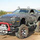 Image for article titled This Lifted 'Forsche' 944 Is The Great Unholy Bronco-Porsche Mashup We Deserve